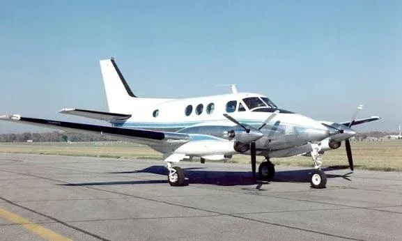 A Beechcraft King Air C90 twin turboprop on the ramp